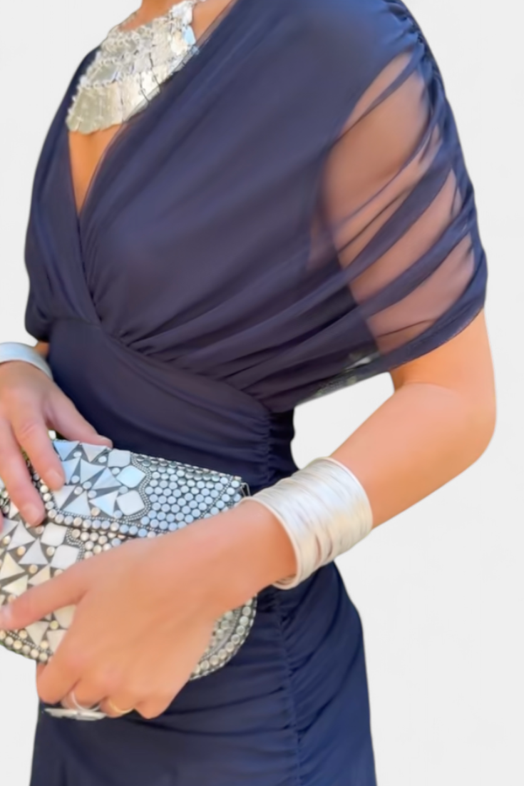 Navy blue ruched maxi dress with sheer wrap overlay and side ruching detail