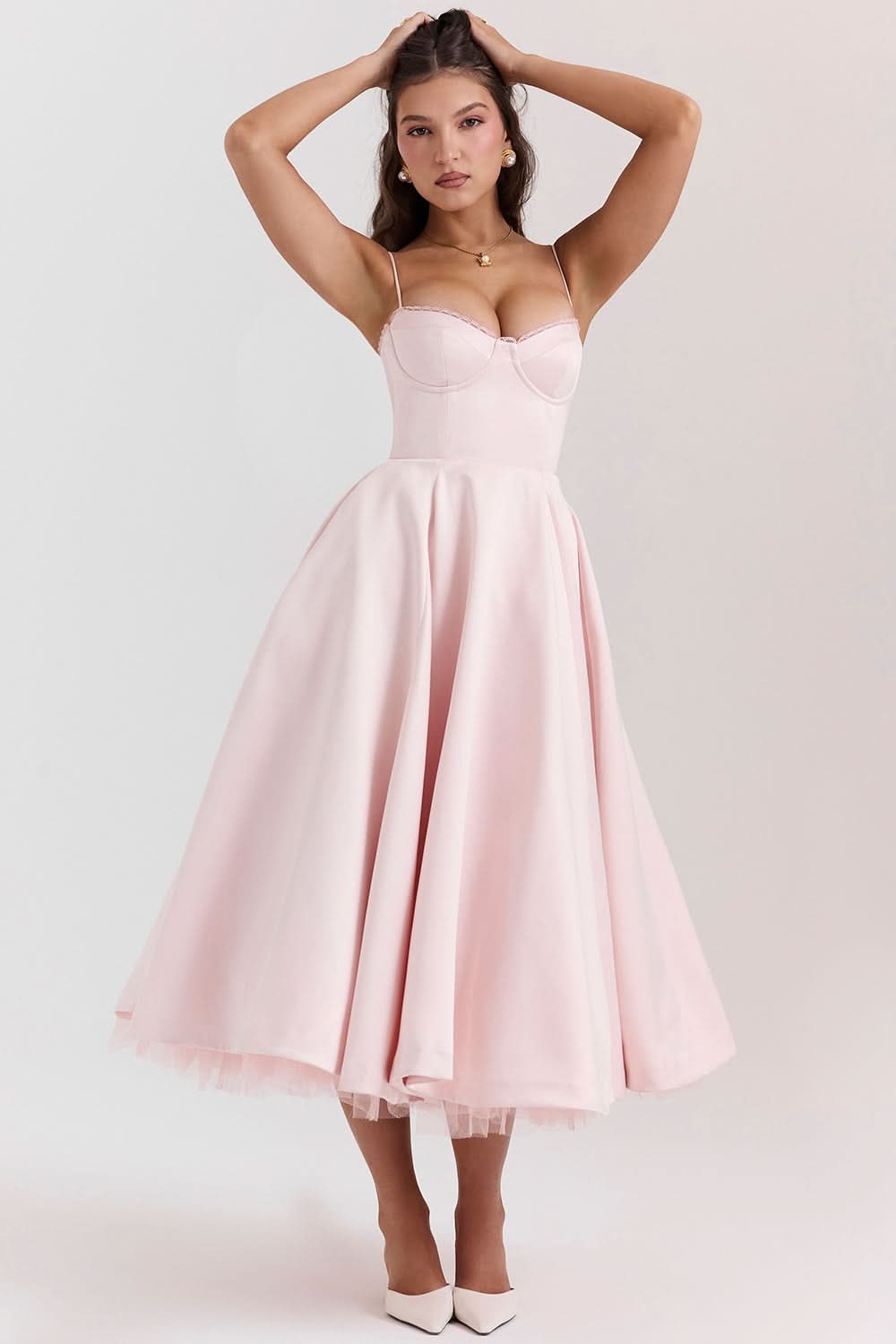 Light pink corset midi dress with structured bustier top and tulle hem