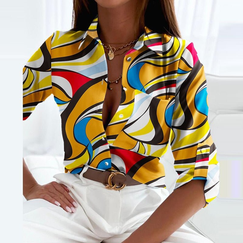 Multicolor geometric collared top with yellow, blue, red and black abstract pattern