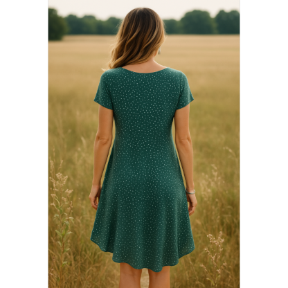 Back view of green polka dot mini dress with A-line silhouette and short sleeves for women