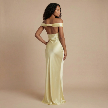 Back view of pale yellow off-shoulder maxi dress showing backless design