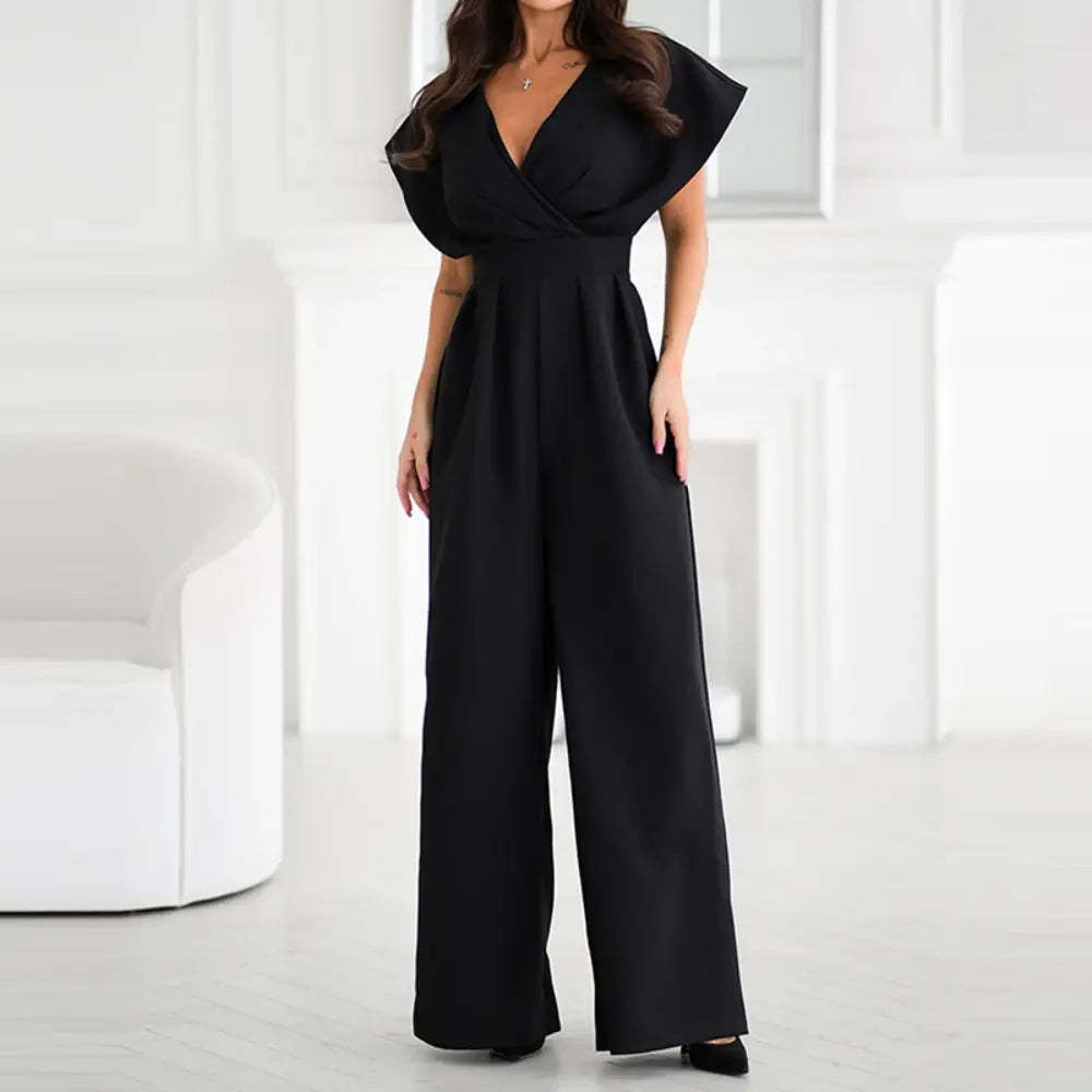 Black wrap jumpsuit front view with V-neckline and flowing wide legs