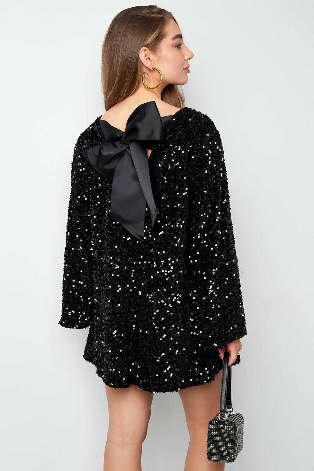 Black sequin dress with black bow back detail rear view