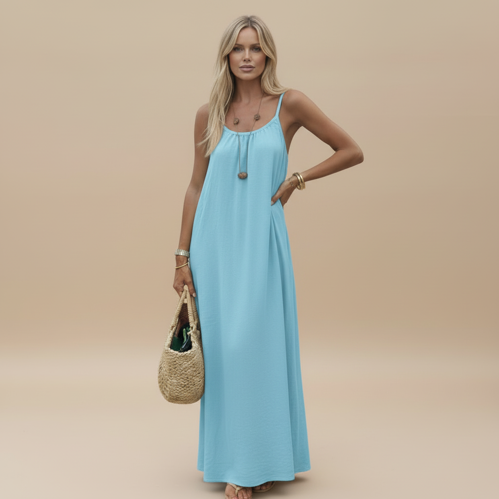 Light blue sleeveless maxi dress with gathered neckline and relaxed fit silhouette
