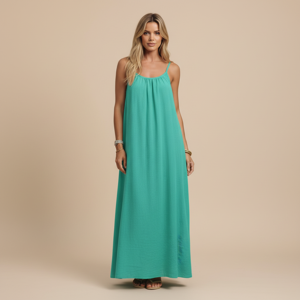Teal green sleeveless maxi dress with ruched bodice and floor-length hem