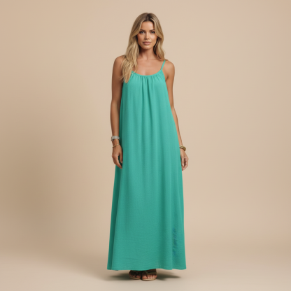 Teal green sleeveless maxi dress with ruched bodice and floor-length hem