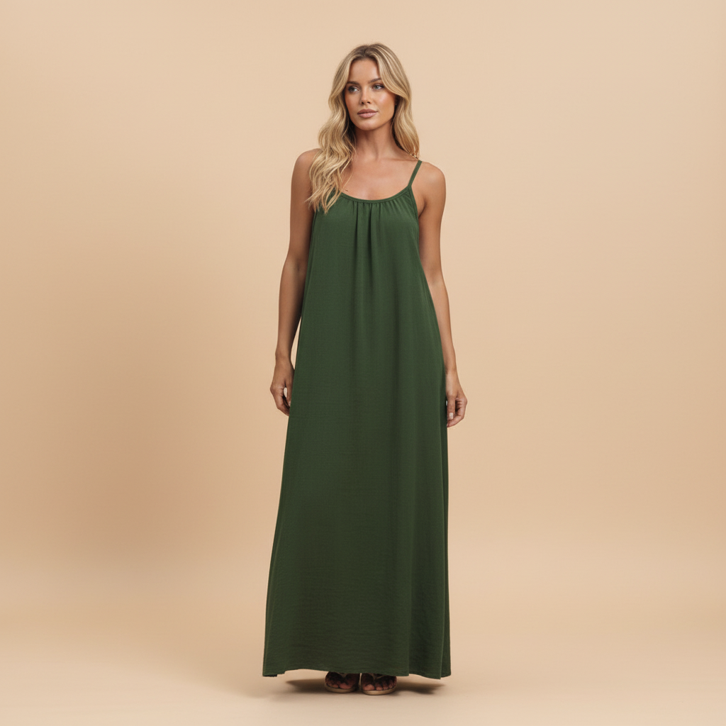 Forest green ruched maxi dress with thin straps and gathered neckline