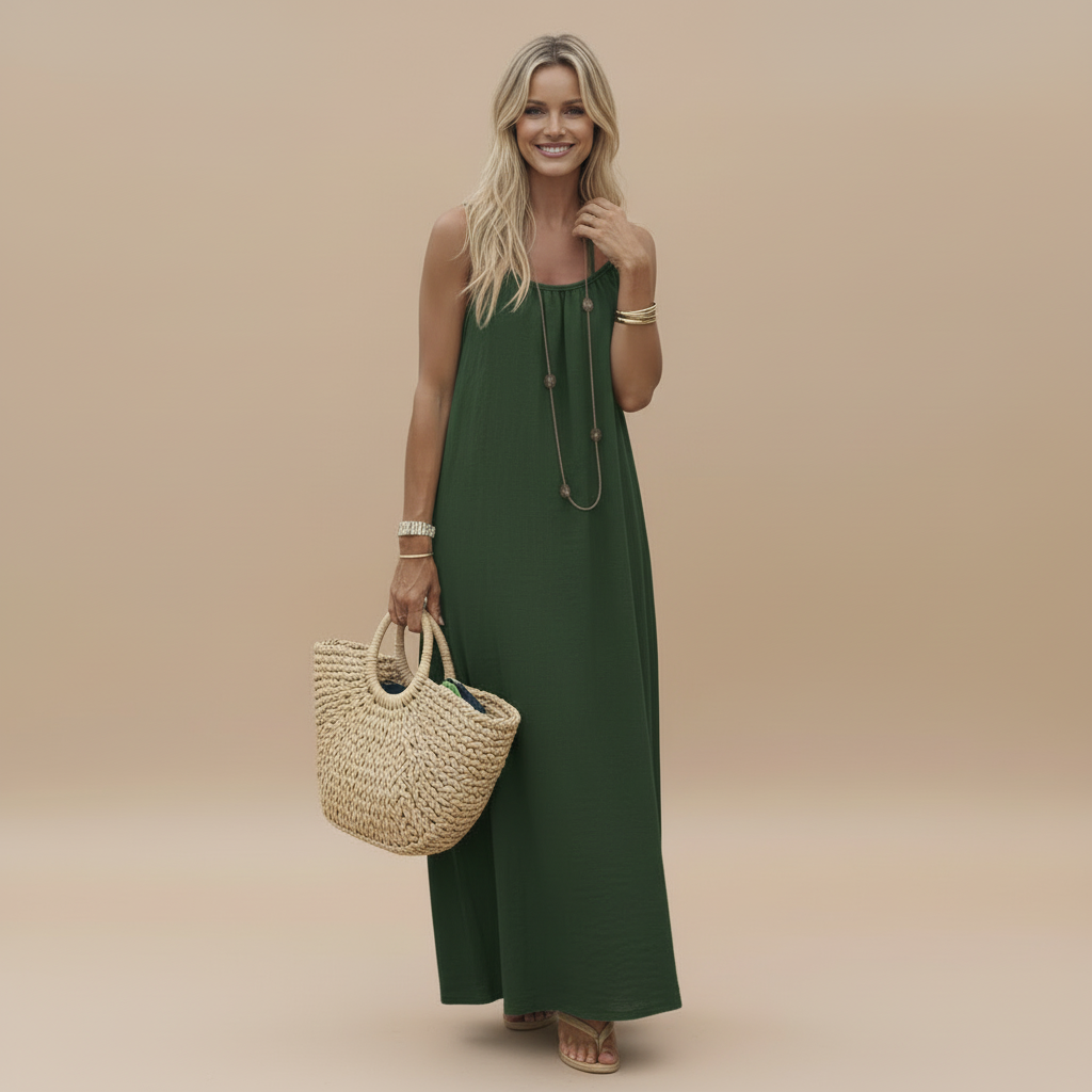 Sage green sleeveless maxi dress with ruched bodice and long hem