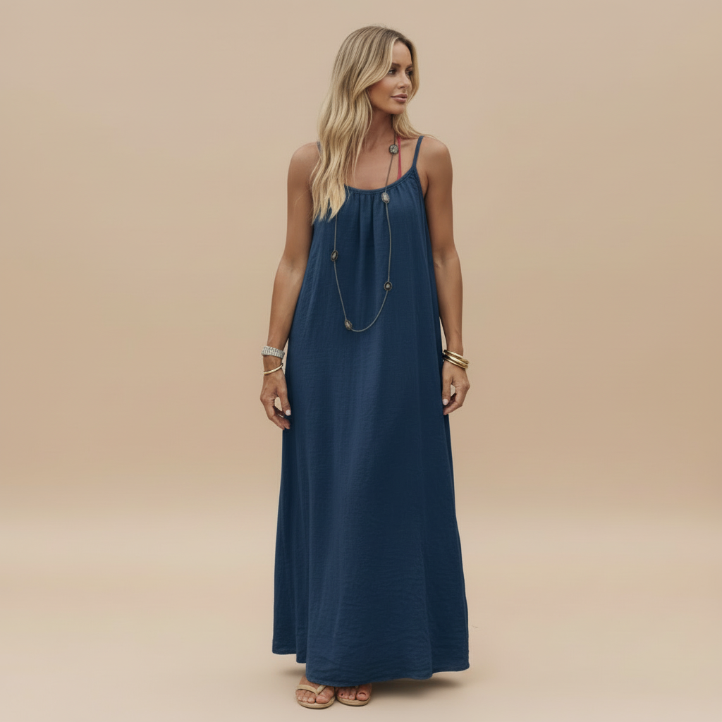 Navy blue ruched maxi dress with spaghetti straps and gathered neckline