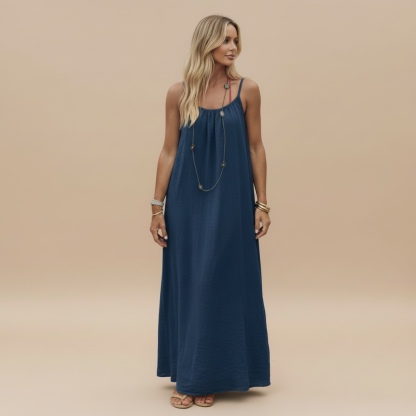 Navy blue ruched maxi dress with spaghetti straps and gathered neckline