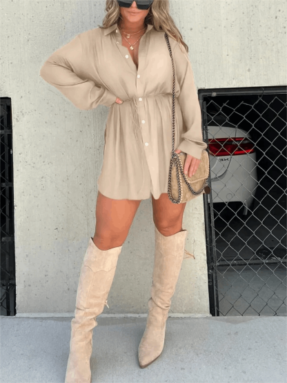 Beige button-front mini romper with long sleeves and tie waist