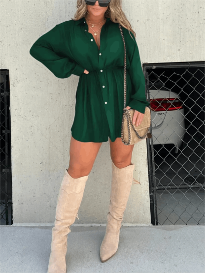 Forest green button-front mini romper with long sleeves and cinched waist