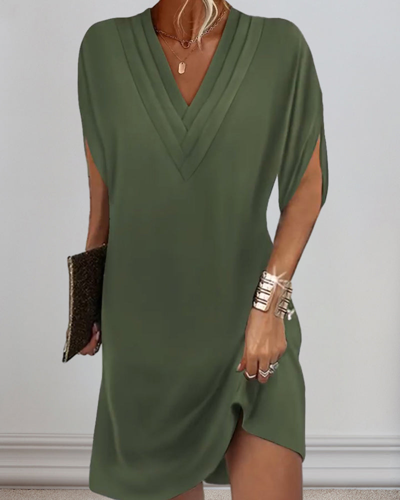 Olive green draped mini dress with V-neckline and short sleeves