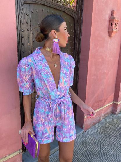 Purple multicolor wrap mini romper with abstract print and tie waist