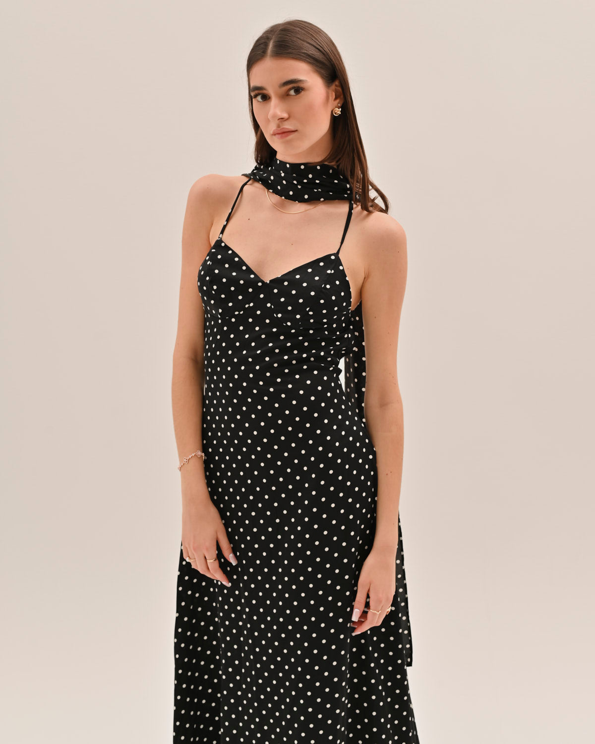 Black and white polka dot maxi dress with sweetheart neckline and matching choker collar