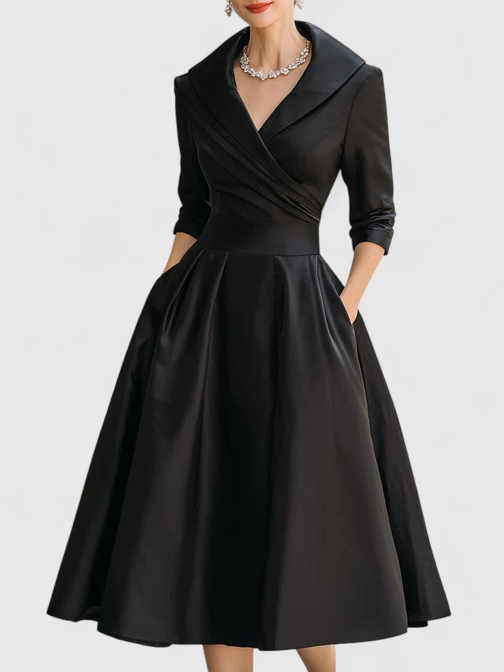 Black wrap midi dress with three-quarter sleeves and full skirt