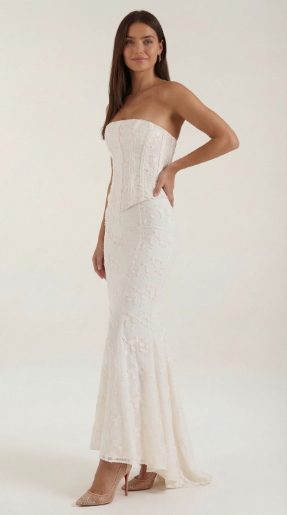 Fitted ivory lace corset dress with mermaid hem and maxi length for formal occasions