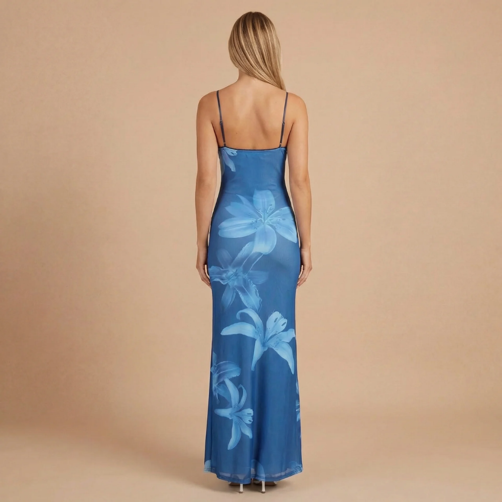 Blue floral maxi dress with open back and spaghetti straps, rear view