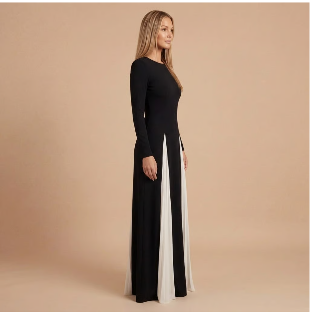 Long-sleeve colorblock maxi dress side profile showing flowing pleated white panels