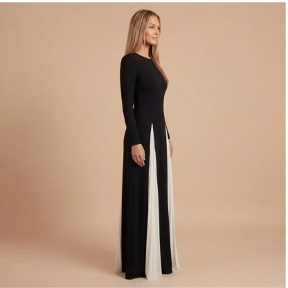 Long-sleeve colorblock maxi dress side profile showing flowing pleated white panels