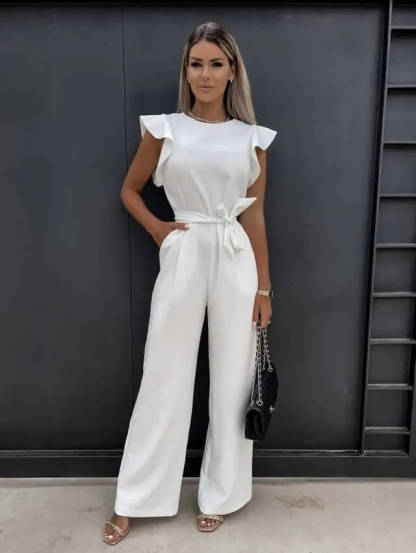 Cream ruffle jumpsuit full length front view with tie waist