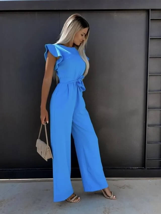 Bright blue ruffle sleeve jumpsuit with tie waist and wide legs