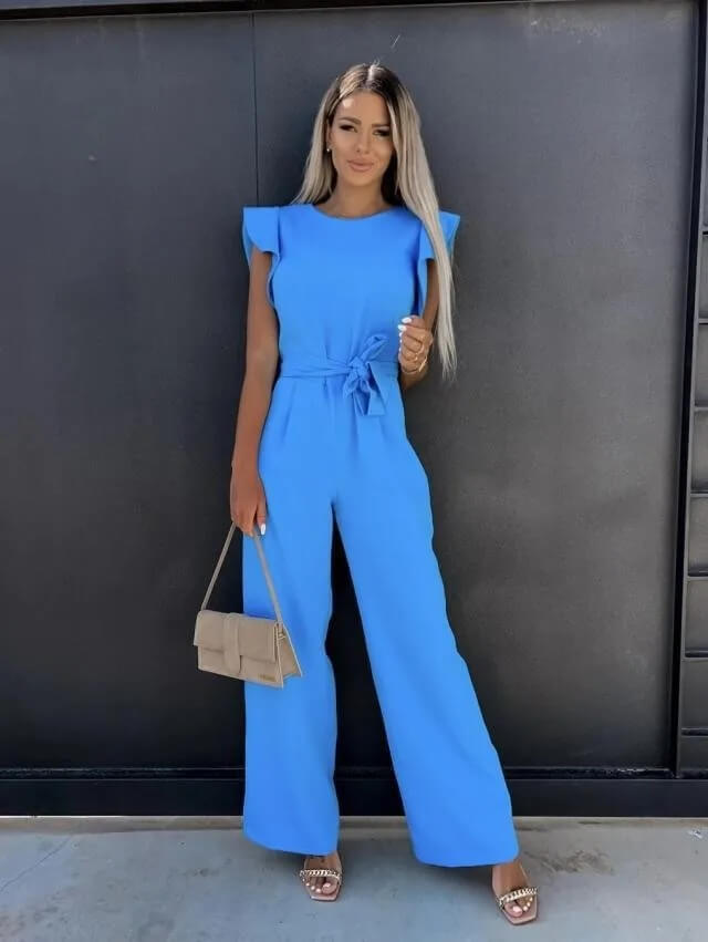 Blue ruffle jumpsuit front view with belted waist and ruffled sleeves