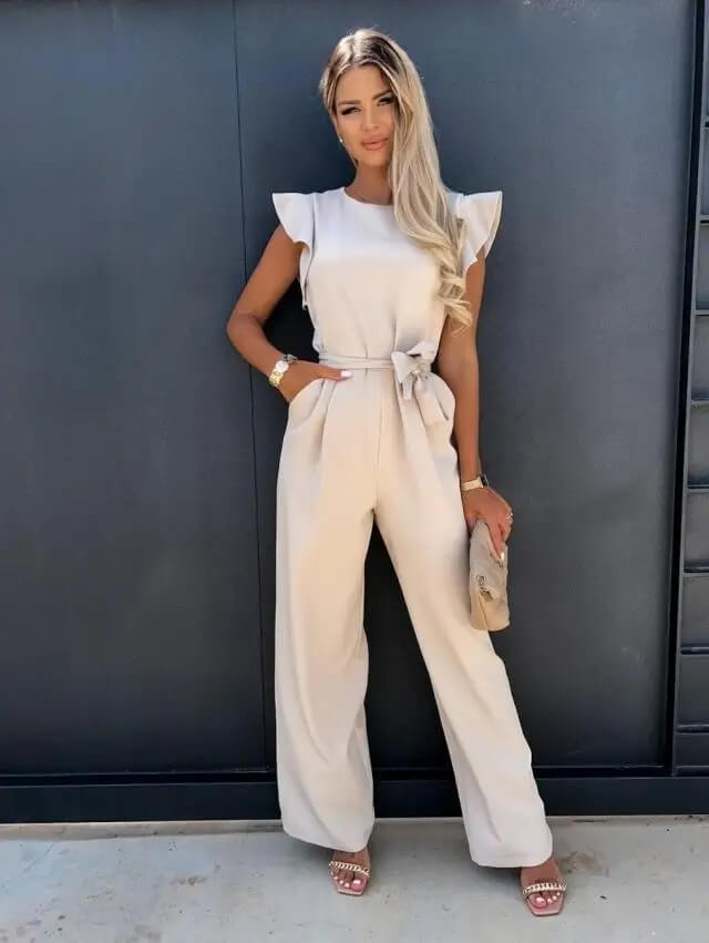 Cream ruffle sleeve jumpsuit with tie waist and wide-leg pants