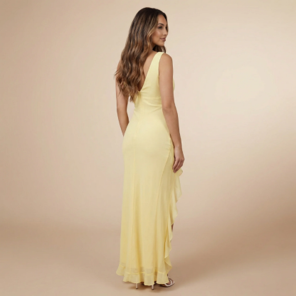 Yellow ruffle maxi dress side view showing high-low asymmetrical hem