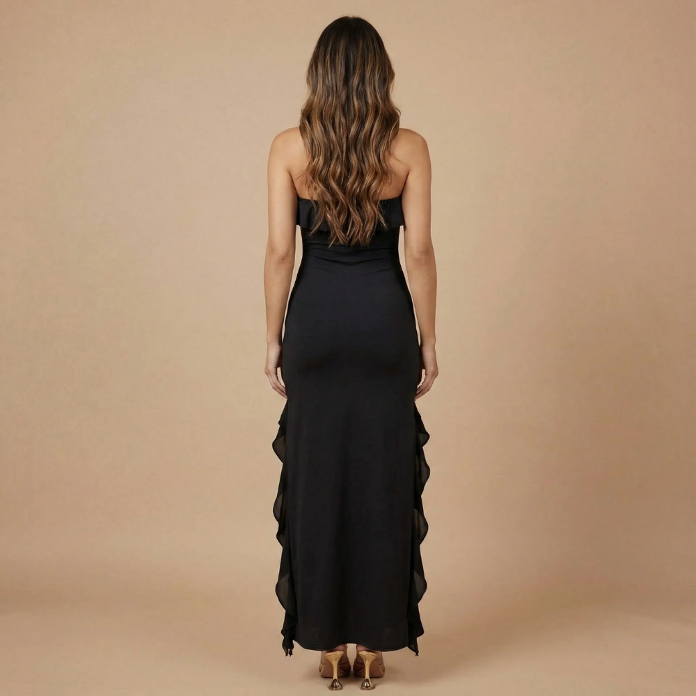 Black strapless ruffle maxi dress back view showing cascading ruffles and clean neckline
