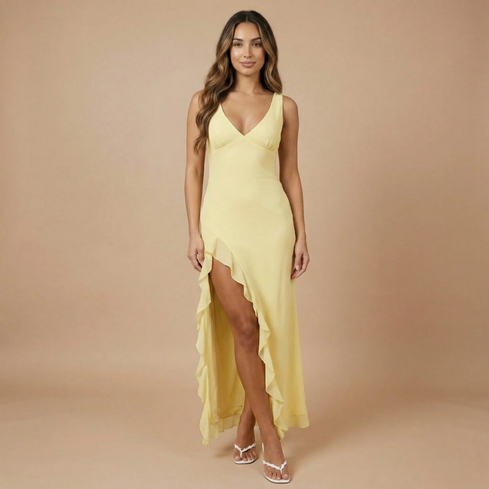 Pale yellow V-neck maxi dress with asymmetrical ruffle hem for women