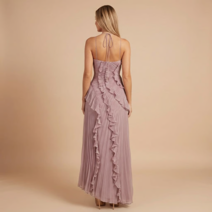 Back view of mauve pleated midi dress showing tie-back closure