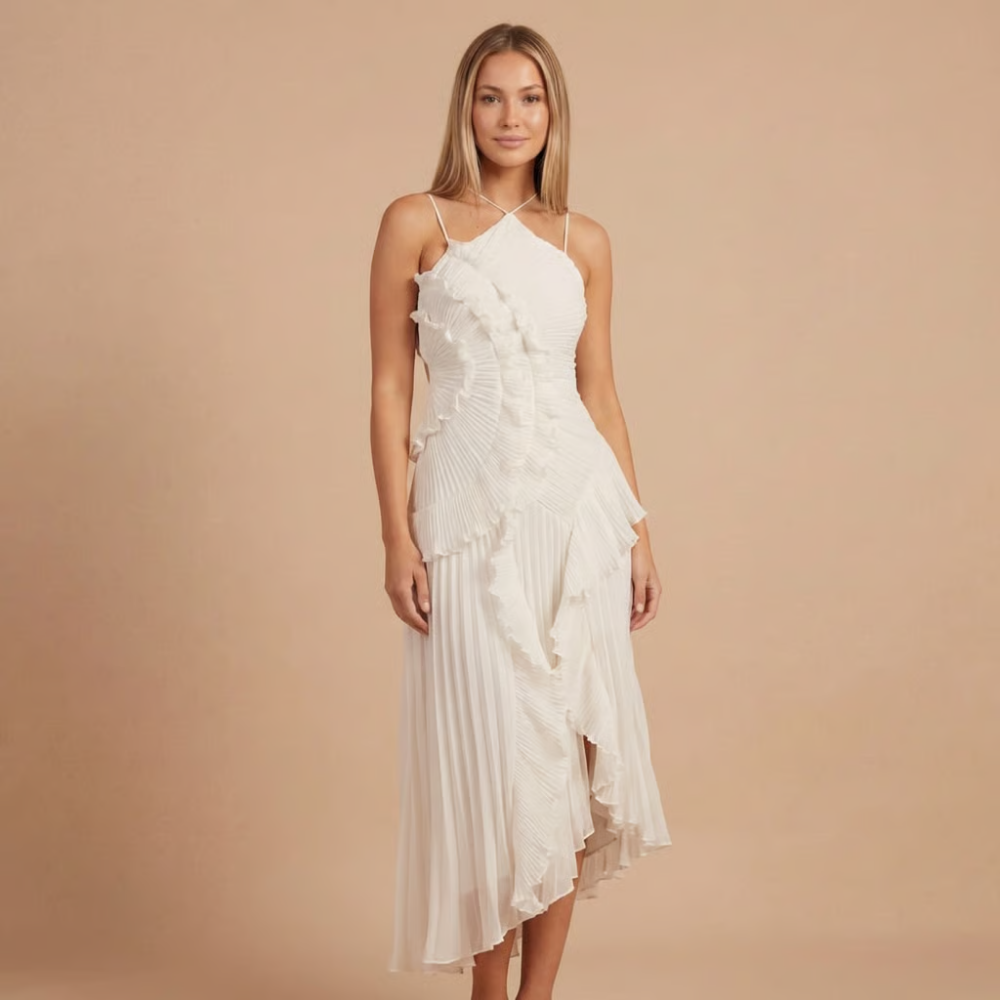 Front view of ivory ruffle midi dress with crossover halter straps