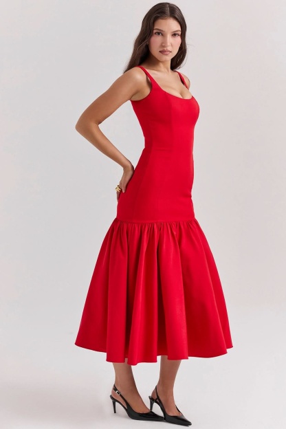 Red ruffle midi dress back view with scoop neckline and voluminous ruffled hem