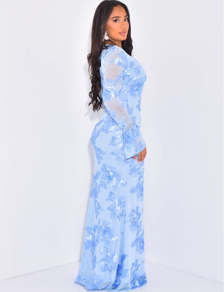 Blue sequin maxi dress back view showing sheer mesh and fitted silhouette