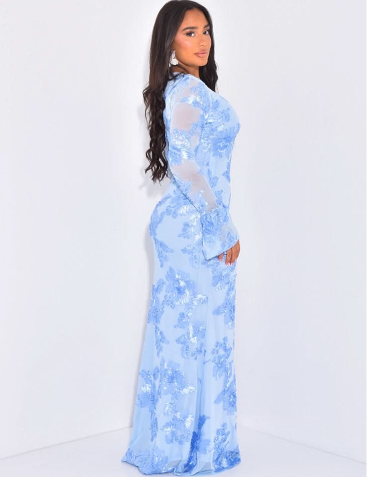 Blue sequin maxi dress back view showing sheer mesh and fitted silhouette