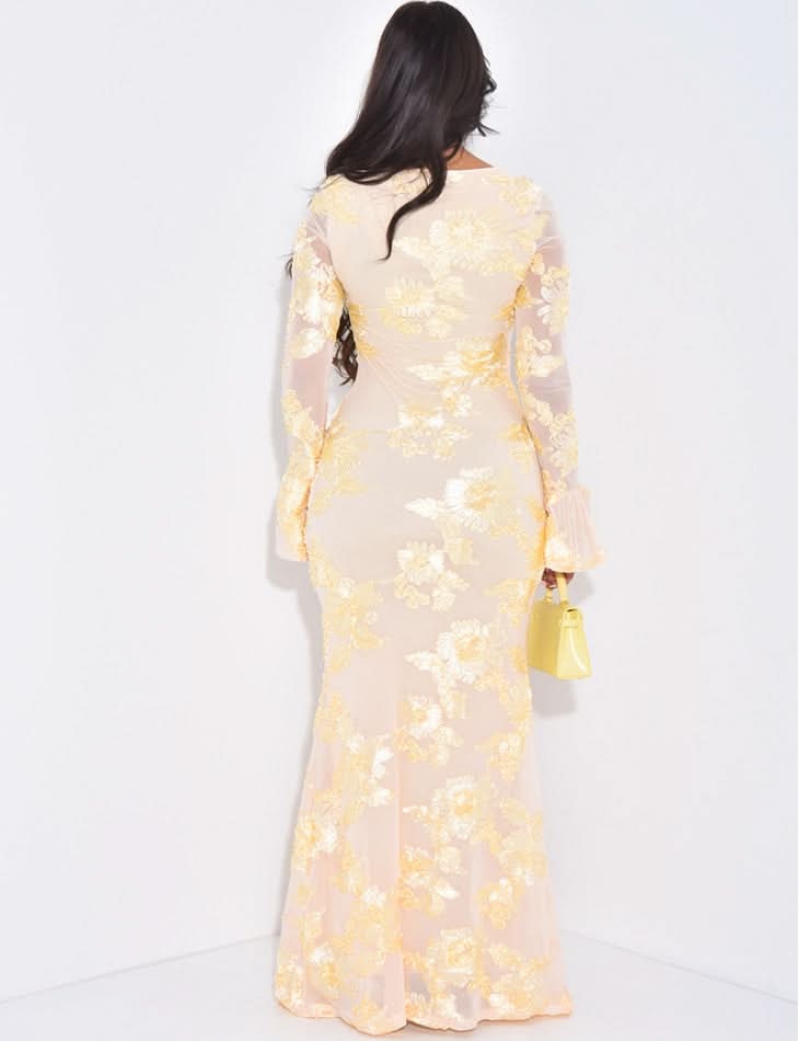 Cream gold sequin maxi dress back view with sheer sleeves and floral details
