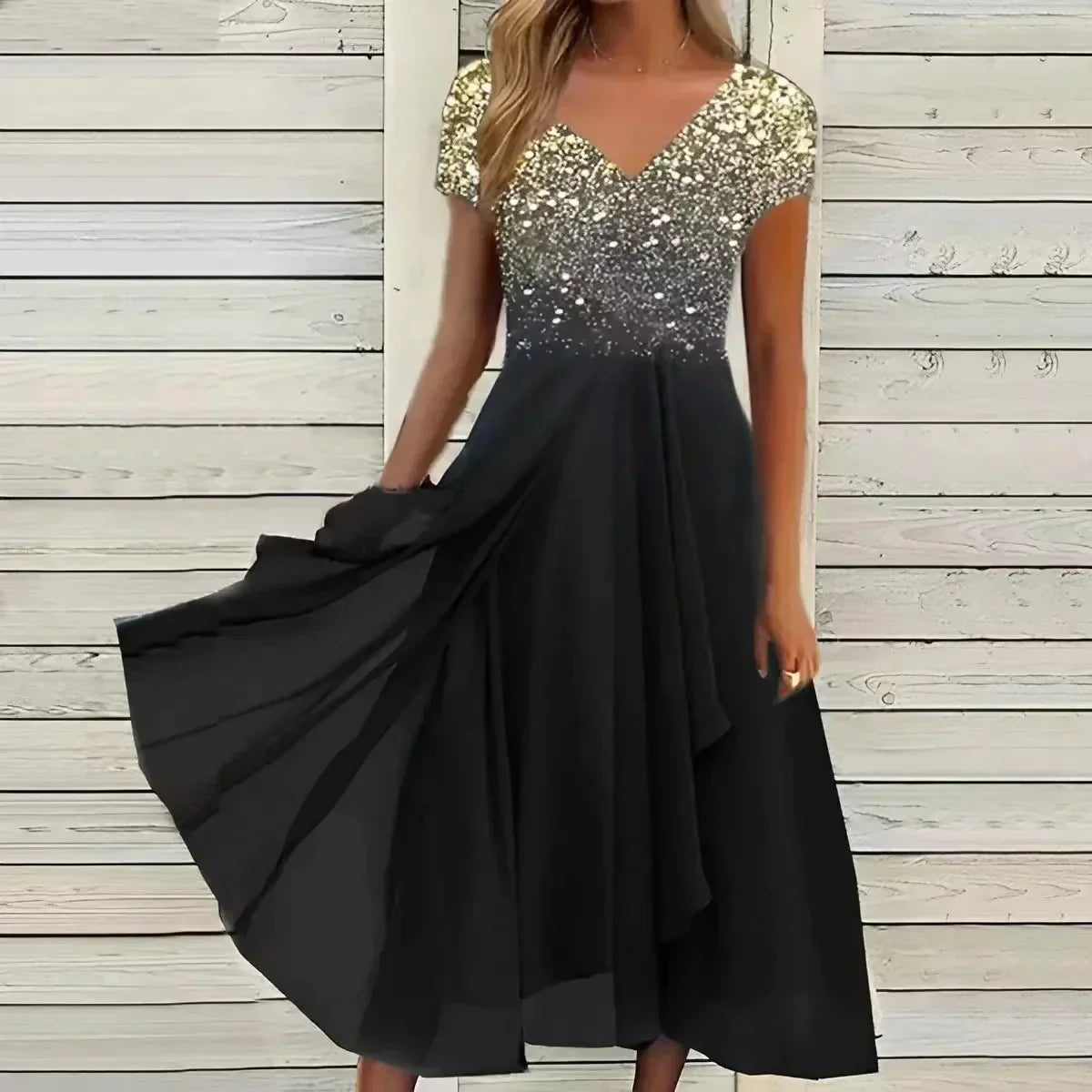 Silver sequin midi dress with v-neckline and black flowing chiffon skirt