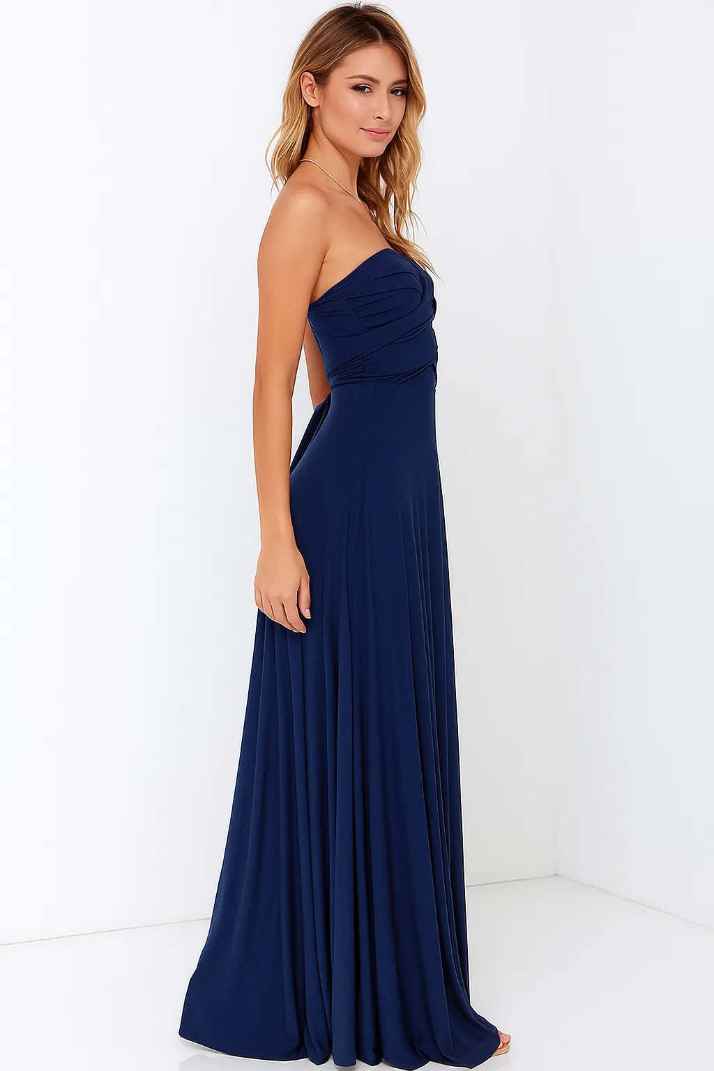 Side profile of navy wrap maxi dress with draped bodice