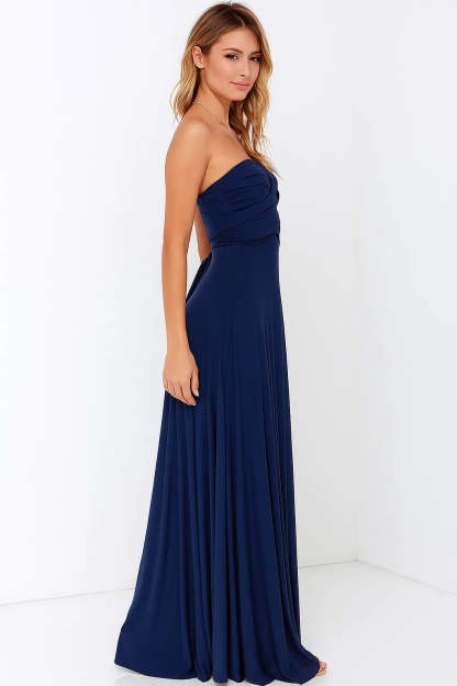 Side profile of navy wrap maxi dress with draped bodice