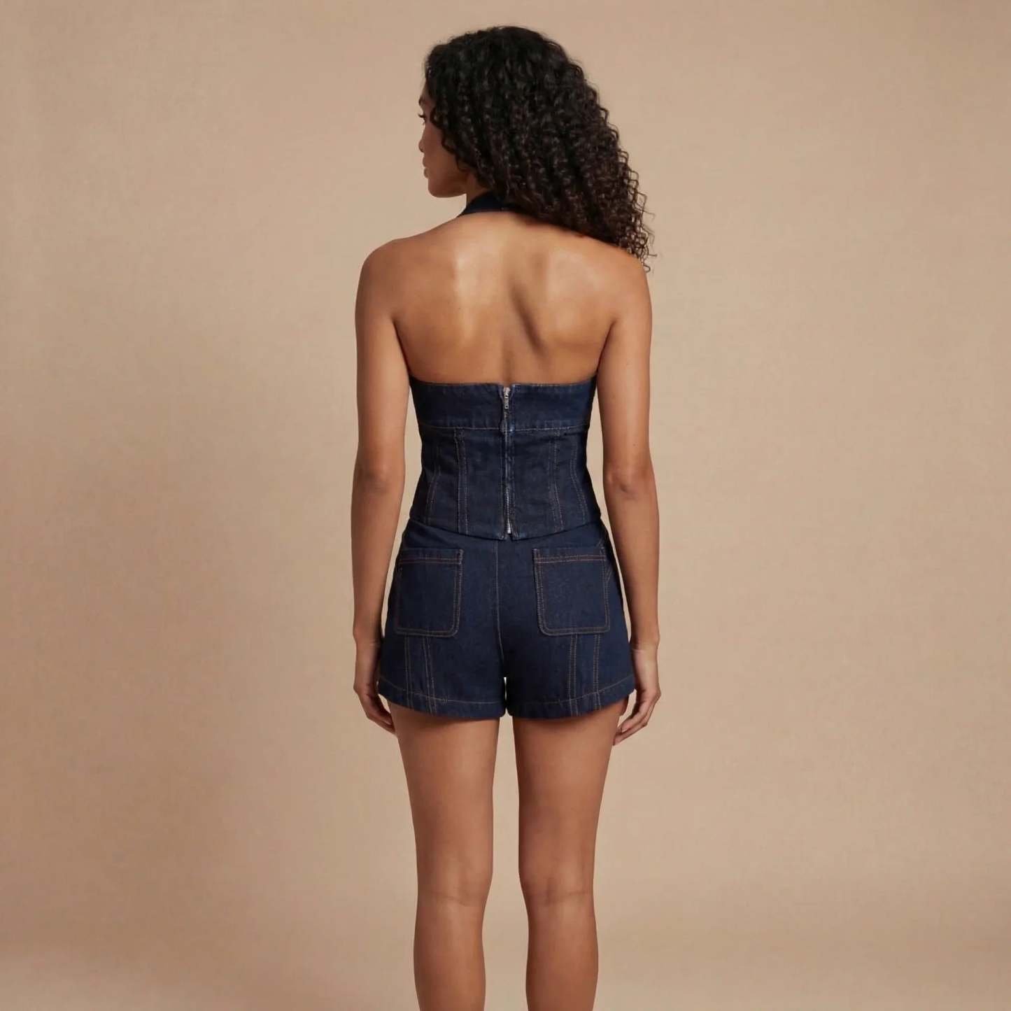 Dark indigo denim corset shorts set back view showing center zipper closure