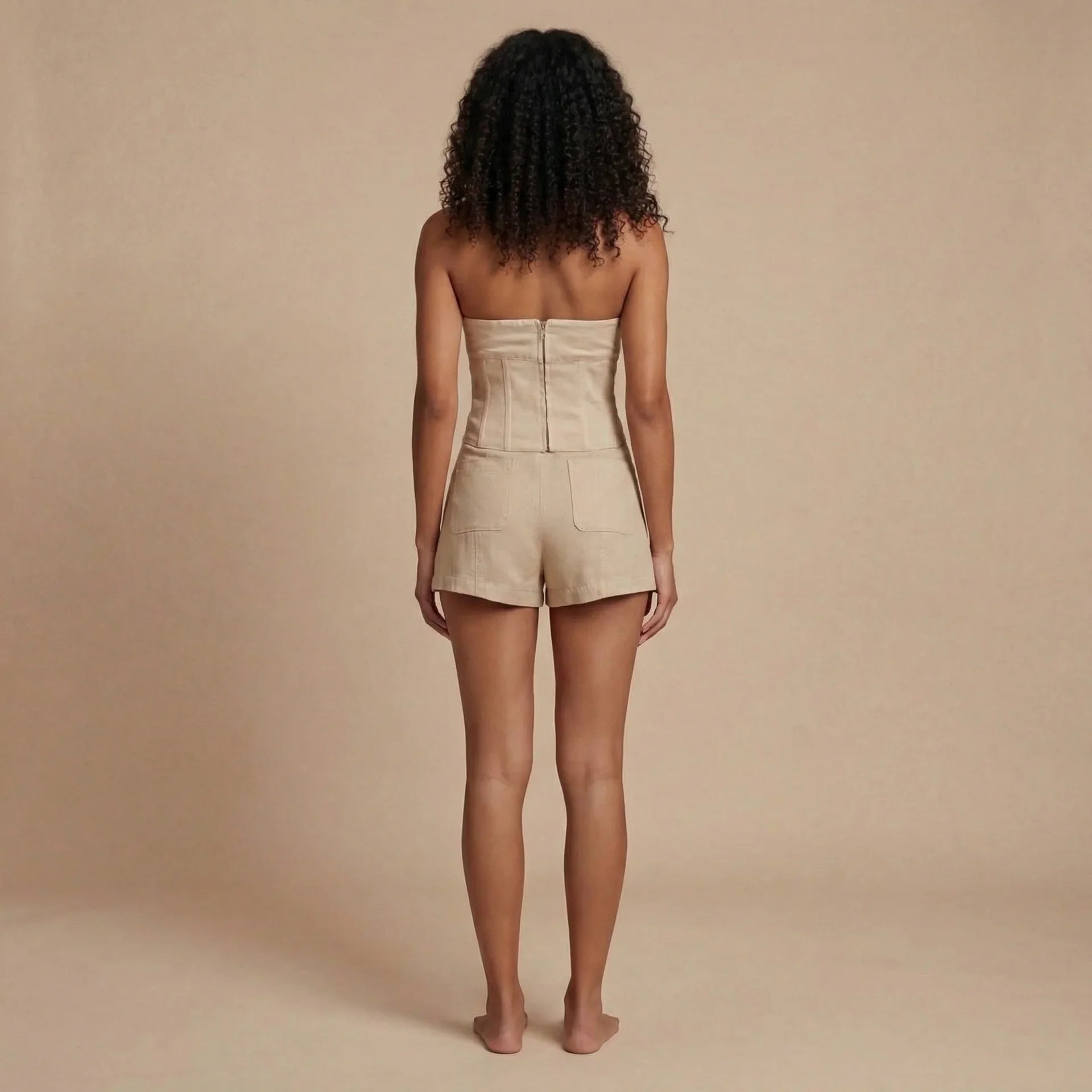 Cream denim corset shorts set rear view with back zipper and pocket detailing