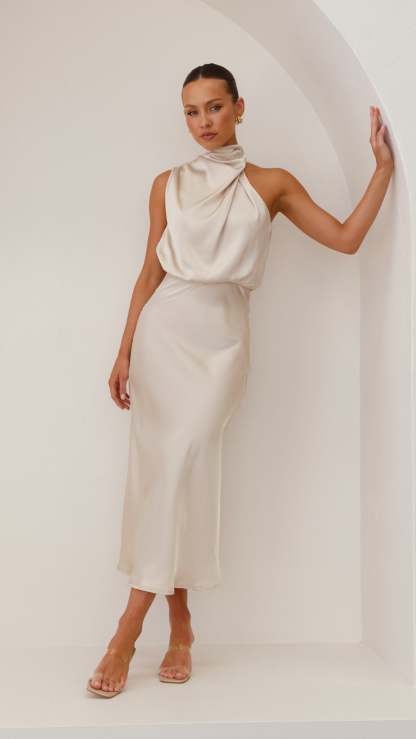 Cream halter midi dress with draped cowl neck and tapered silhouette