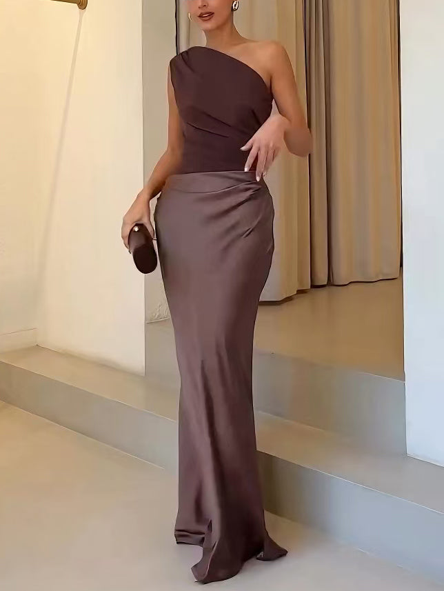 Burgundy one-shoulder ruched maxi dress back view with flowing skirt