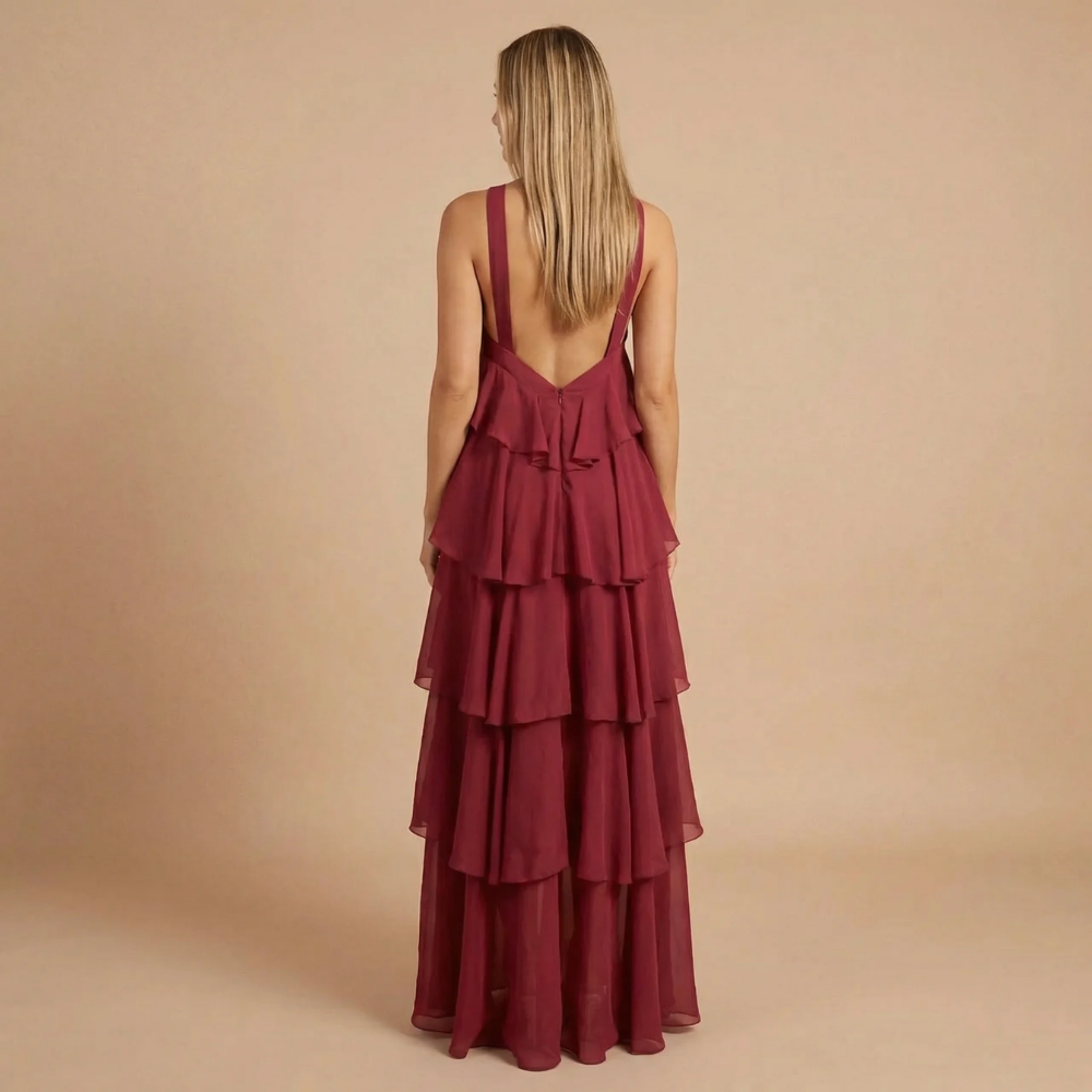 Back view of burgundy ruffle maxi dress with low open back