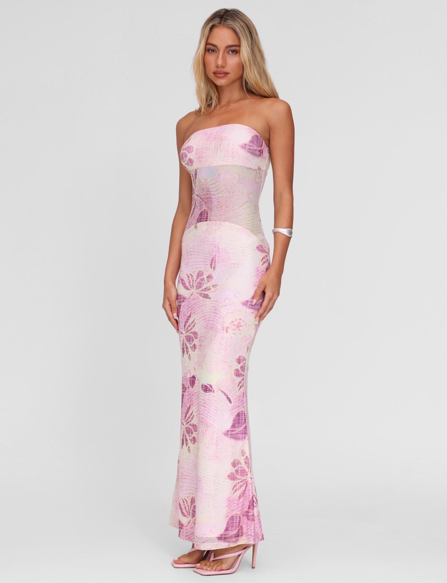 Strapless pink maxi dress with purple floral pattern and sheer waist detail