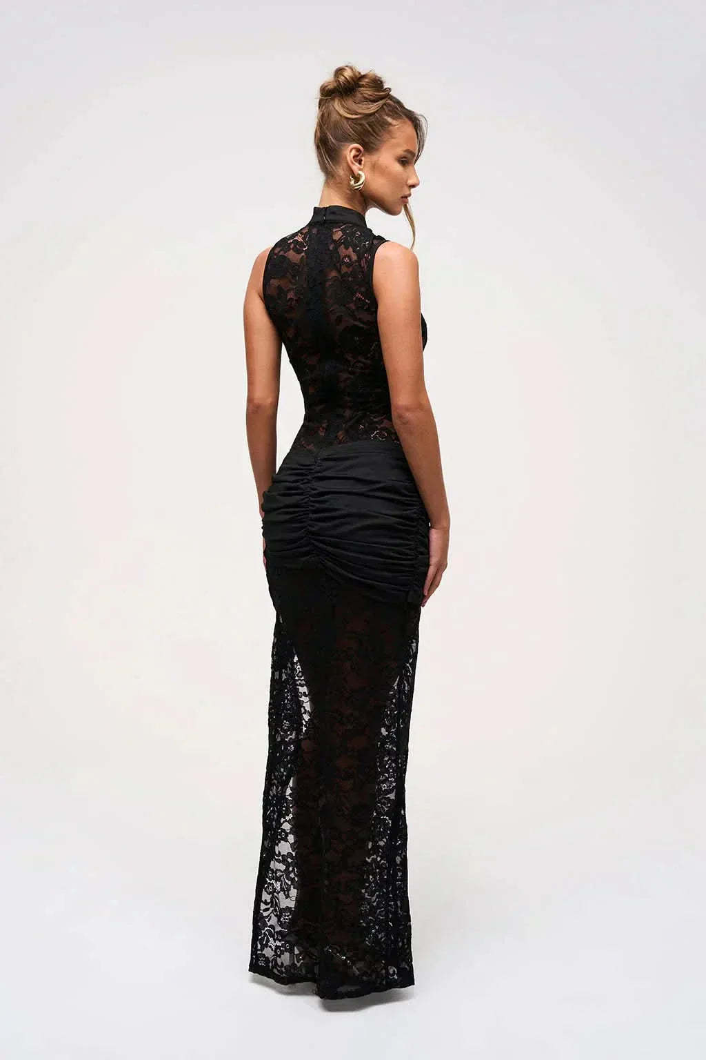 Back view black lace maxi dress with ruched waist and high slit