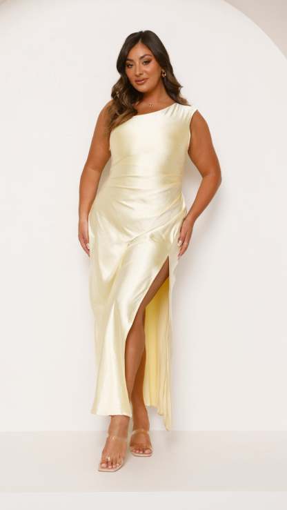 Sleeveless cream satin maxi dress with ruched waist and thigh slit