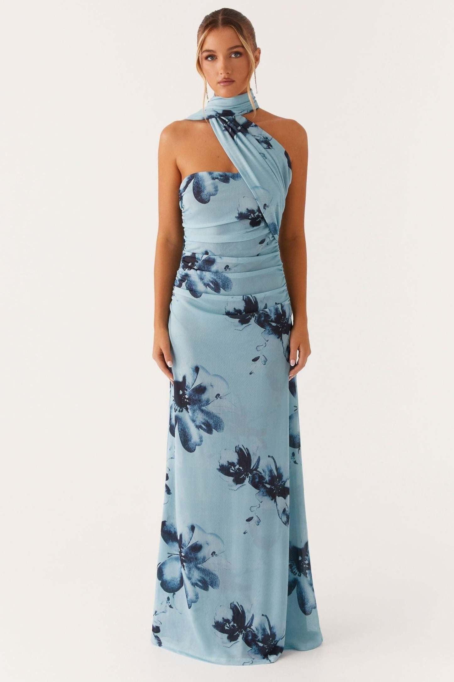 Light blue halter maxi dress with navy floral print and horizontal ruching throughout
