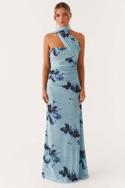 Light blue halter maxi dress with navy floral print and horizontal ruching throughout